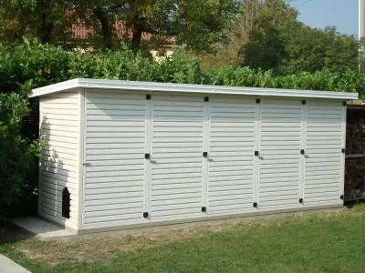 House with slatted wall in sandwich isolated panel