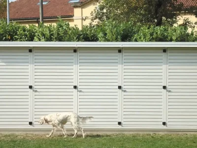 House with slatted wall in sandwich isolated panel